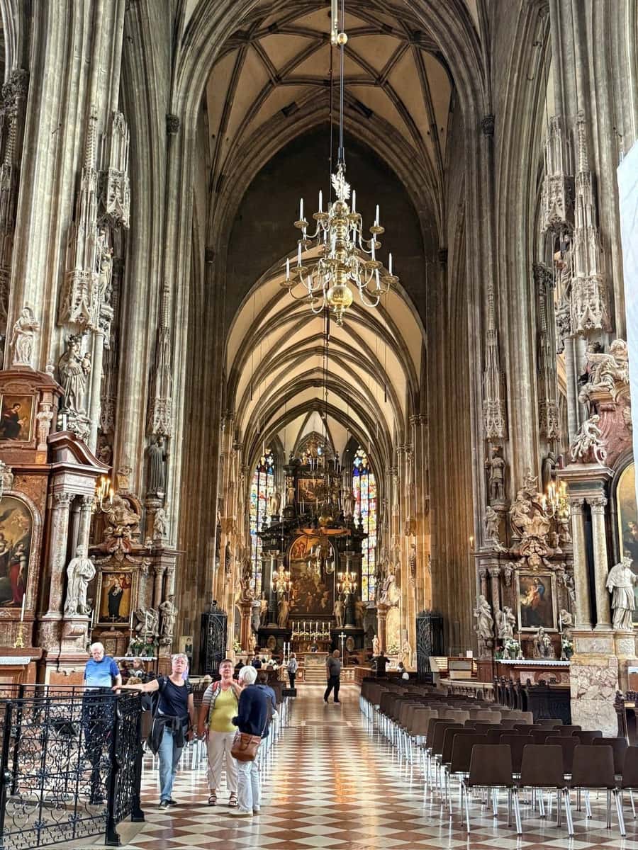 Cathedral interior with vaulted ceilings and stained glass windows