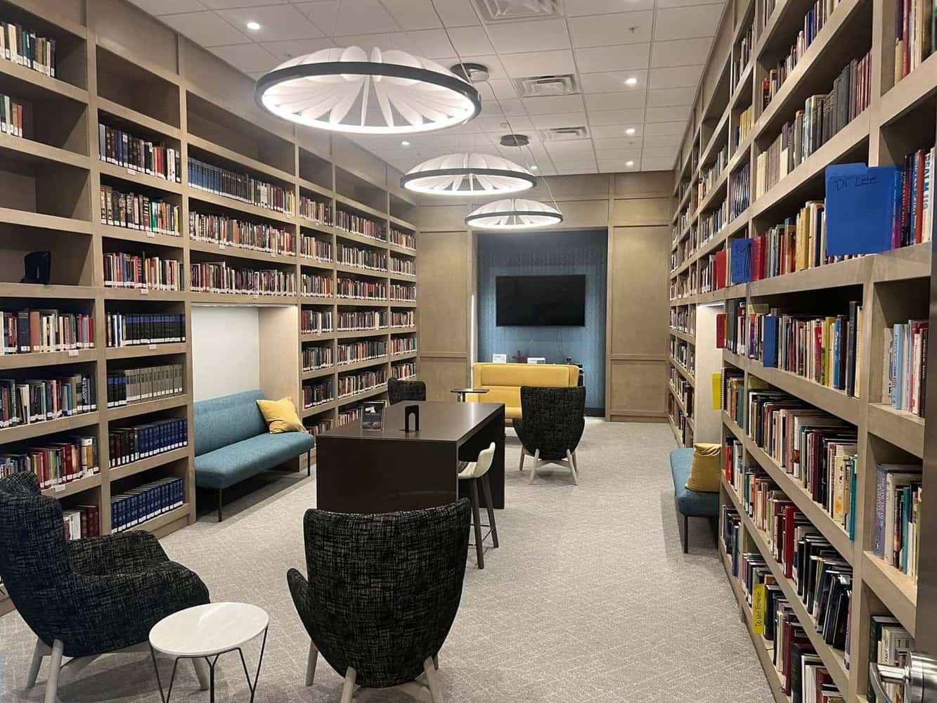Church library with bookshelves and modern lighting