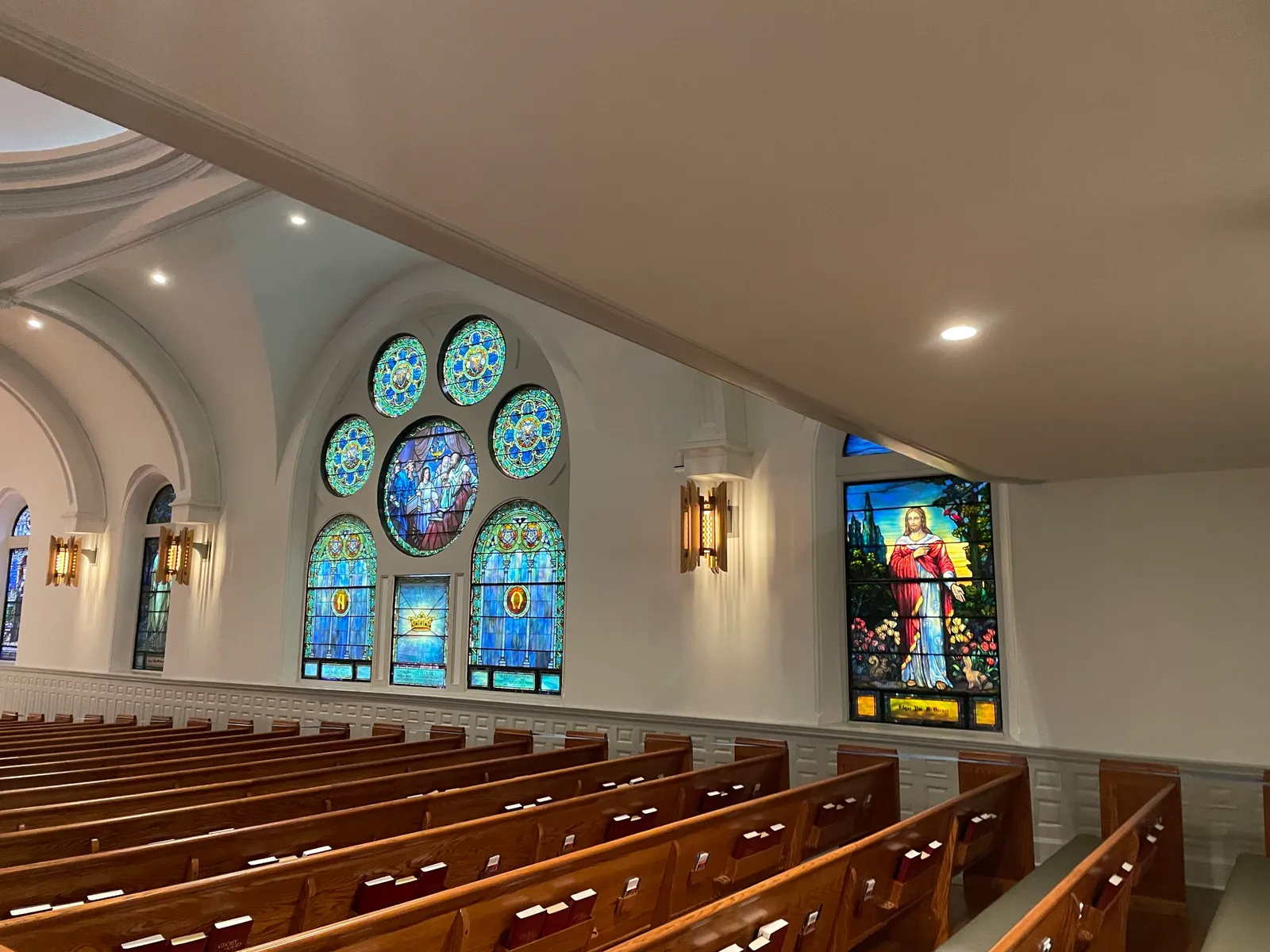 Stained glass rose window at North Avenue Presbyterian Church — irreplaceable church property