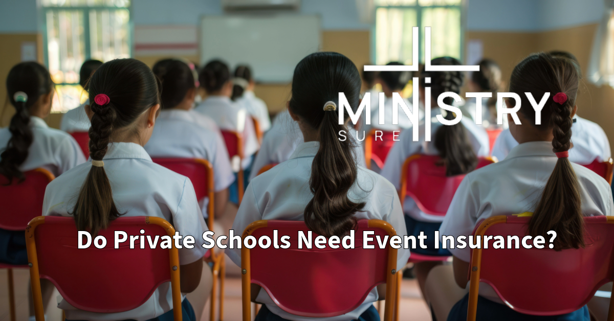 A classroom filled with students seated in rows, facing forward towards the front of the room. The MinistrySure logo is displayed on the top right corner, with the text "Do Private Schools Need Event Insurance?" written at the bottom. The students are wearing white uniforms and red chairs are prominently seen in the image.