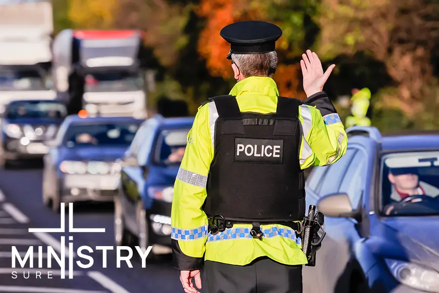 Off Duty Police Officer Directing Traffic for a Church